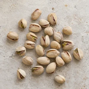 Fandoghi pistachios on a neutral background